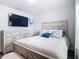 Cozy bedroom with a comfortable bed, stylish dresser, and TV for relaxation, creating a welcoming retreat at 4592 Crabapple Ave, North Port, FL 34287