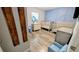 Well lit Bedroom with light blue trim and two cribs to accommodate twins or multiple children at 4592 Crabapple Ave, North Port, FL 34287