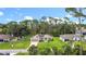 Well-kept home with solar panels, a manicured lawn, and a welcoming facade, perfect for suburban living at 4592 Crabapple Ave, North Port, FL 34287