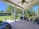Outdoor patio with view of well-manicured backyard at 4611 Executive Meadows Dr, Plant City, FL 33567