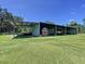 Spacious barn with open bays, ideal for equipment storage, or livestock at 4611 Executive Meadows Dr, Plant City, FL 33567