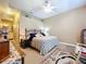 Bedroom boasts vaulted ceilings, warm neutral walls, and a cozy area rug at 4611 Executive Meadows Dr, Plant City, FL 33567