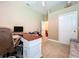 Bedroom with lots of space, large desk, and a comfortable sitting area at 4611 Executive Meadows Dr, Plant City, FL 33567