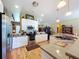 Modern kitchen with stainless steel appliances, granite counters, and hardwood floors at 4611 Executive Meadows Dr, Plant City, FL 33567