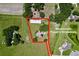 Overhead view displaying the approximate acreage surrounding the home and outbuilding at 4611 Executive Meadows Dr, Plant City, FL 33567