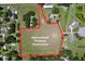 Aerial view showing large, open lot with approximate property dimensions at 4611 Executive Meadows Dr, Plant City, FL 33567