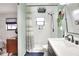 Beautiful bathroom features modern fixtures, tiled shower, and unique design elements at 4616 Edwards Rd, Plant City, FL 33567