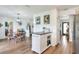 Open dining area with modern lighting, casual seating and view of the kitchen and other living spaces at 4616 Edwards Rd, Plant City, FL 33567