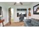This living room features a comfortable sofa and convenient built-in storage at 4616 Edwards Rd, Plant City, FL 33567