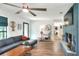Inviting living room featuring stylish decor, hardwood floors, and a modern, comfortable setting at 4616 Edwards Rd, Plant City, FL 33567