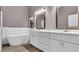 Gorgeous bathroom with soaker tub, double vanity, and lots of storage space at 8050 Eacon Ct, Hudson, FL 34667