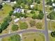 Bird's eye view of home highlighting its backyard with pool and surrounding landscape in a quiet residential area at 12410 Myrtlewood Dr, Riverview, FL 33579