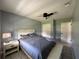 Comfortable bedroom with a ceiling fan and soothing color scheme at 37341 Rutledge Dr, Zephyrhills, FL 33541