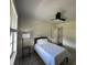 Cozy bedroom with a neutral color scheme and lots of natural light from the window at 37341 Rutledge Dr, Zephyrhills, FL 33541