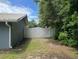 A white vinyl fence secures the property line, offering both privacy and a clean, modern look at 37341 Rutledge Dr, Zephyrhills, FL 33541