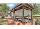 Private boat dock features a covered boat lift, offering convenience for waterfront living at 9934 Peninsular Dr, Gibsonton, FL 33534