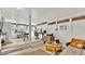 Spacious, versatile living space featuring a functional layout with natural light, perfect for an office or Gathering room at 9934 Peninsular Dr, Gibsonton, FL 33534