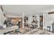 Versatile living space with wood-look flooring, suitable for office, recreation, or additional living area at 9934 Peninsular Dr, Gibsonton, FL 33534