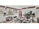Cozy home office space with natural light, providing a functional and comfortable work environment at 9934 Peninsular Dr, Gibsonton, FL 33534