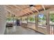 Spacious covered patio with ceiling fans and scenic outdoor views at 9934 Peninsular Dr, Gibsonton, FL 33534