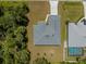 An aerial view showcasing the home's layout, landscaping, and surrounding area at 3157 Bay City Ter, North Port, FL 34286