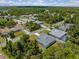 Aerial view of a neighborhood, showcasing the home's location and surrounding landscape at 3157 Bay City Ter, North Port, FL 34286