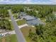 Aerial view of a home and surrounding area at 3157 Bay City Ter, North Port, FL 34286