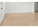 Image of the interior of a room, emphasizing the clean, light-colored wood flooring at 3157 Bay City Ter, North Port, FL 34286
