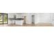 Bright living space with modern flooring, white walls, and an open layout, leading to the kitchen and outdoor patio at 3157 Bay City Ter, North Port, FL 34286
