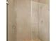 Tiled shower with frameless glass door at 3157 Bay City Ter, North Port, FL 34286