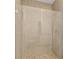 Frameless glass shower with tile surround at 3157 Bay City Ter, North Port, FL 34286
