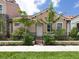 Cute house with a landscaped yard and a welcoming entrance at 930 E Venice Ave, Venice, FL 34285