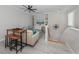 Bright bonus room features built-in shelving and comfortable seating at 934 E Venice Ave, Venice, FL 34285