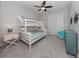 Charming bedroom with a bunk bed, dresser, and a comfy beanbag chair at 934 E Venice Ave, Venice, FL 34285