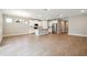 Open concept kitchen and dining area with island and stainless steel appliances at 1508 Atwater Dr, North Port, FL 34288