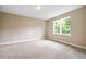 Spacious bedroom with neutral walls and carpet flooring at 1508 Atwater Dr, North Port, FL 34288