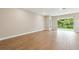 Bright living room featuring tile floors and sliding glass doors leading to the backyard at 1508 Atwater Dr, North Port, FL 34288
