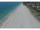 Aerial view of pristine beach and ocean at 12209 Cotorro Ave, North Port, FL 34287