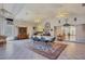 Sunroom with a large dining table and access to an outdoor area at 12209 Cotorro Ave, North Port, FL 34287