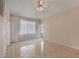 Spacious bedroom with tile flooring and ample closet space at 12209 Cotorro Ave, North Port, FL 34287