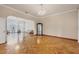 Spacious living room with hardwood floors and ample natural light at 12209 Cotorro Ave, North Port, FL 34287