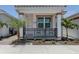 Front view of a charming villa with a landscaped yard at 117 Clifton Way, Venice, FL 34292