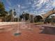 Community water fountain area with tiled floor at 117 Clifton Way, Venice, FL 34292
