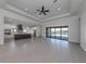 Open concept kitchen with large island and stainless steel appliances at 1729 Lugano Cir, Nokomis, FL 34275