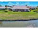 Aerial view showcasing the home's waterfront location at 1633 Ashland Pl, Venice, FL 34292