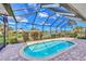 Inviting screened pool and patio area, perfect for relaxation at 1633 Ashland Pl, Venice, FL 34292