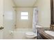 Bright bathroom featuring a tub, toilet and vanity with marble countertop at 383 Circlewood Dr # Z-8, Venice, FL 34293