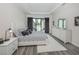 Main bedroom with king-size bed and sliding doors leading to a private patio at 922 E Venice Ave, Venice, FL 34285