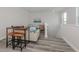 Open concept bonus room with wet bar and seating area at 922 E Venice Ave, Venice, FL 34285