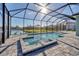 Relaxing pool and spa with screened enclosure at 21220 Holmes Cir, Venice, FL 34293